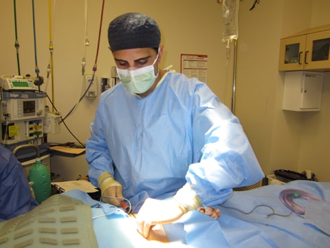 Dr. Zoumalan is harvesting fat from the patient’s abdomen. The fat will then be prepared and injected along the periorbital and other facial regions.