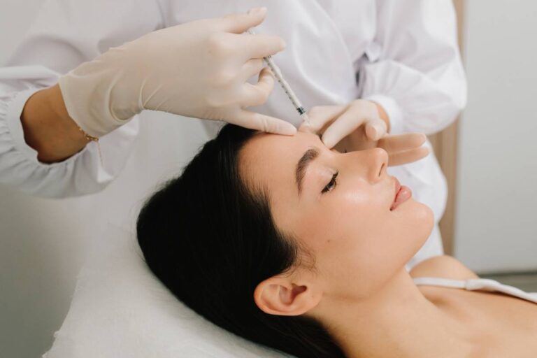 Woman receiving cosmetic procedure.